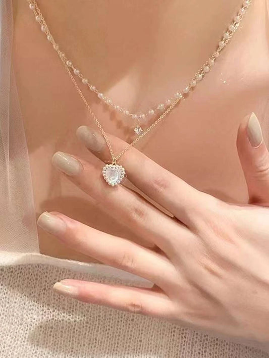SHEIN قلادة متعددة الطبقات بسحر القلوب ولؤلؤ