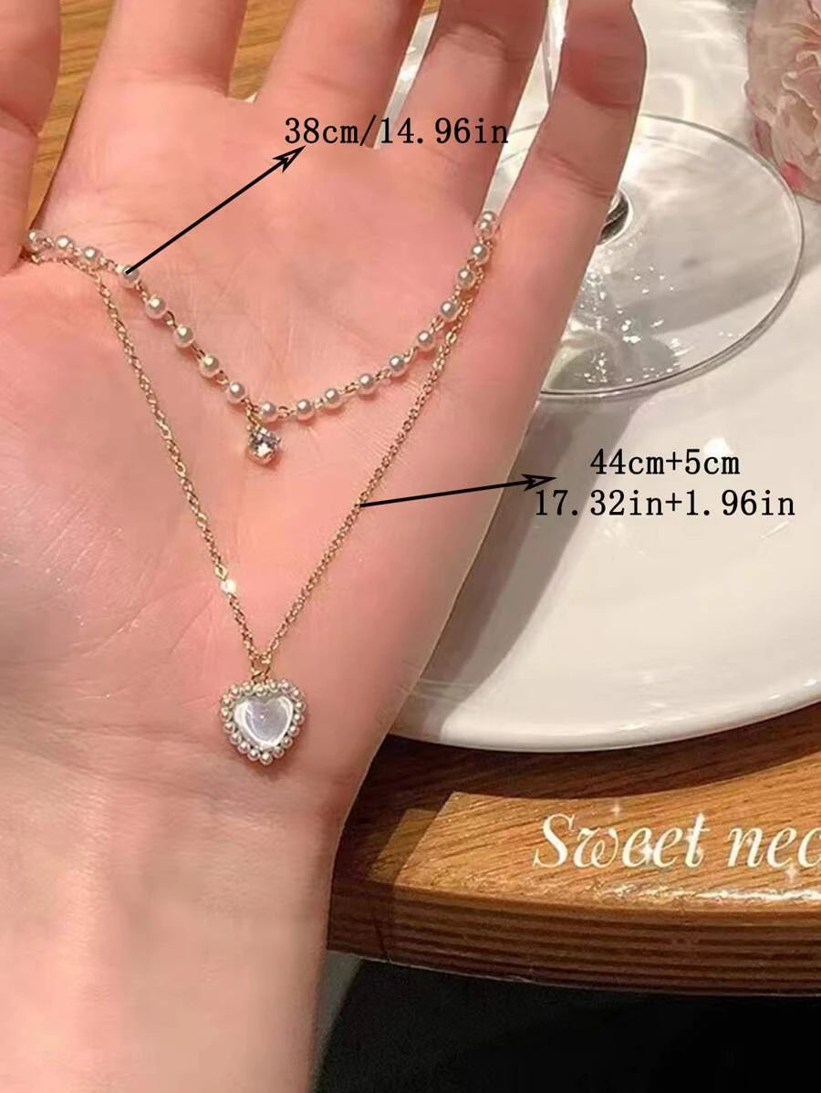 SHEIN قلادة متعددة الطبقات بسحر القلوب ولؤلؤ
