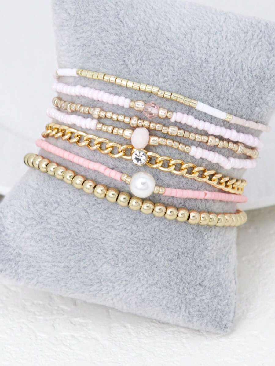 SHEIN مجموعة أساور 7 قطع مطلية بالذهب والوردي بخرز