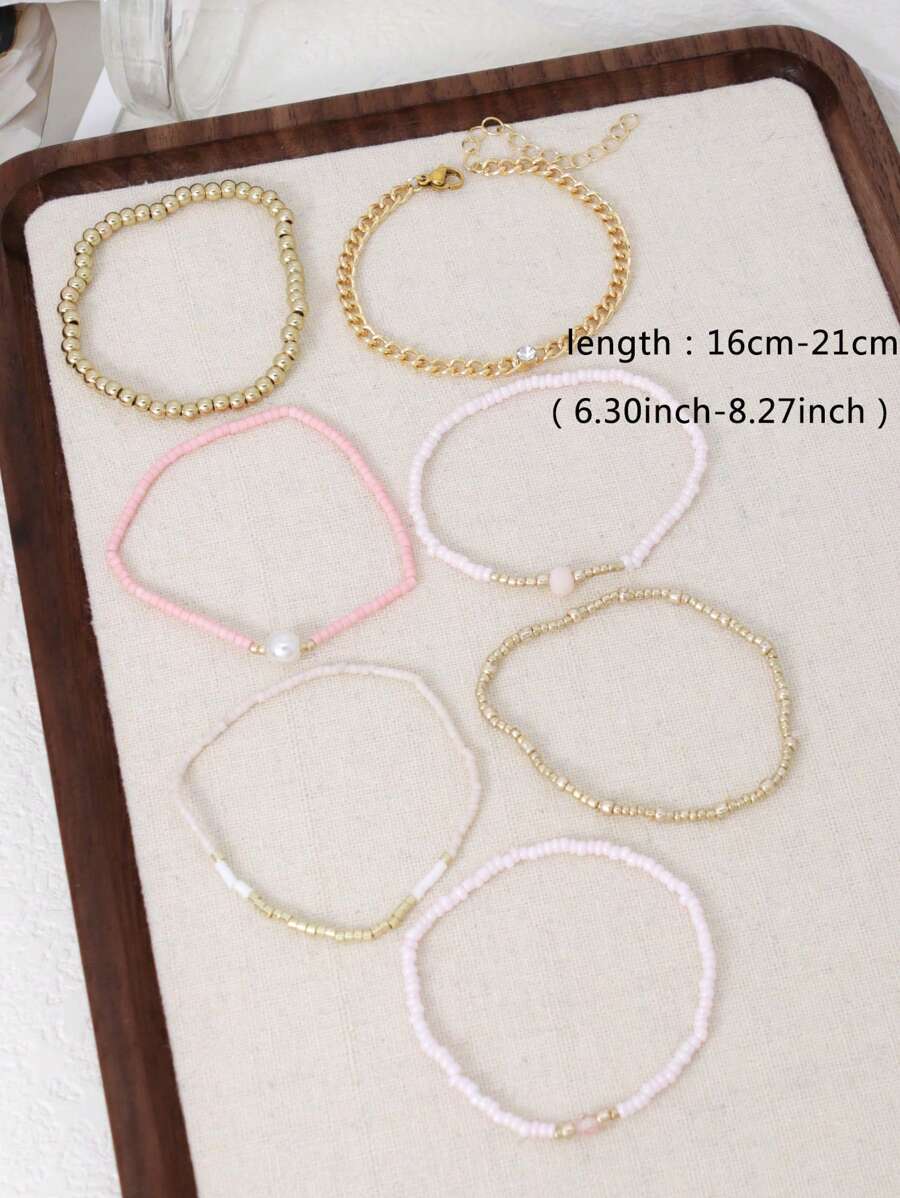 SHEIN مجموعة أساور 7 قطع مطلية بالذهب والوردي بخرز