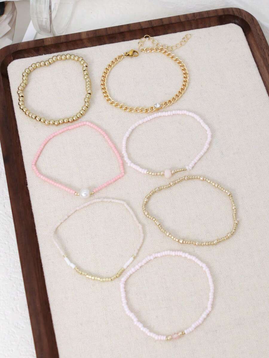 SHEIN مجموعة أساور 7 قطع مطلية بالذهب والوردي بخرز
