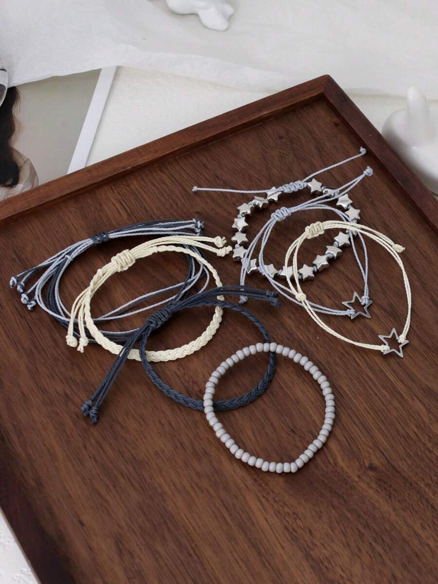 SHEIN طقم 7 أساور خرز بوهيمي متعددة الطبقات مزينة بالنجوم
