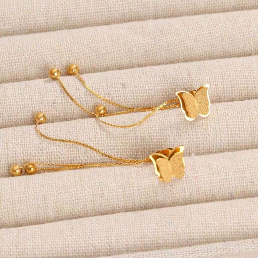 SHEIN زوج أقراط فراشة ستانلس ستيل باللون الذهبي