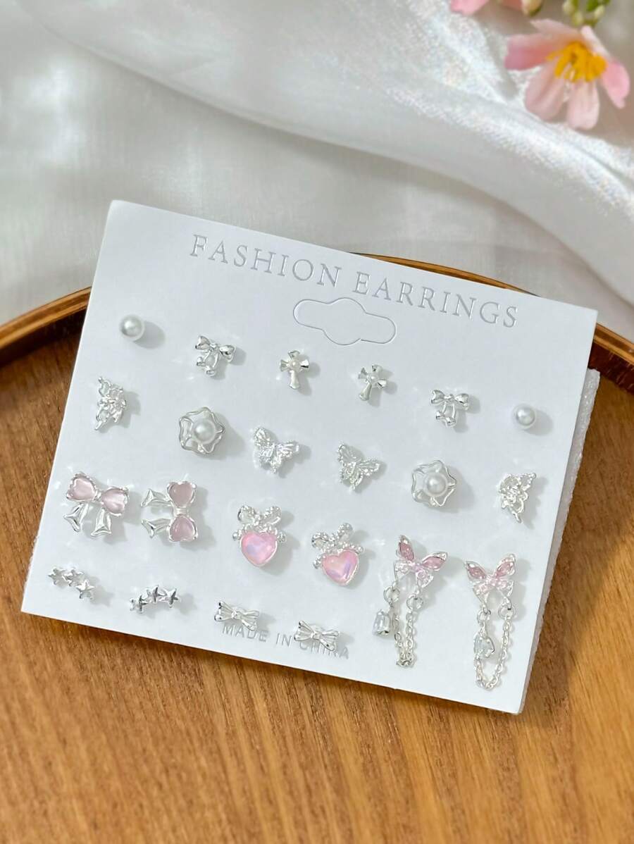 SHEIN مجموعة 11 زوج من أقراط قطة بزخرفة فراشة