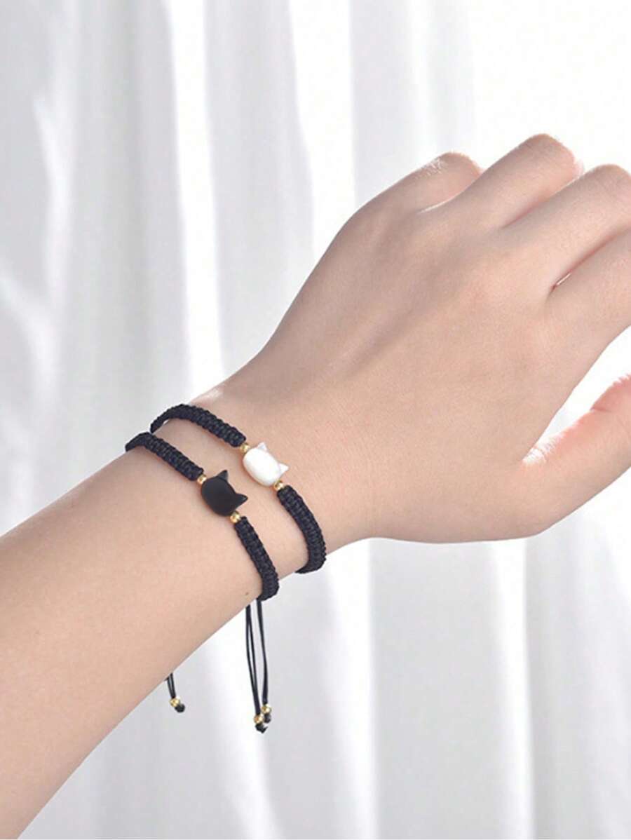 SHEIN مجموعة أساور 2 قطعة مزينة بتميمة قطة سوداء