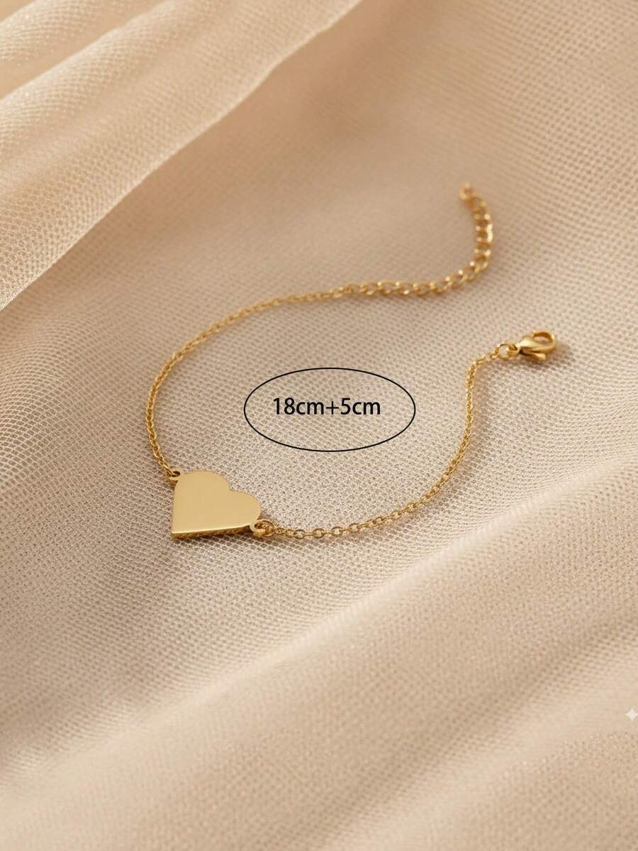 SHEIN طقم 2 سوار فولاذ مطلي ذهب 18 مع تميمة قلب