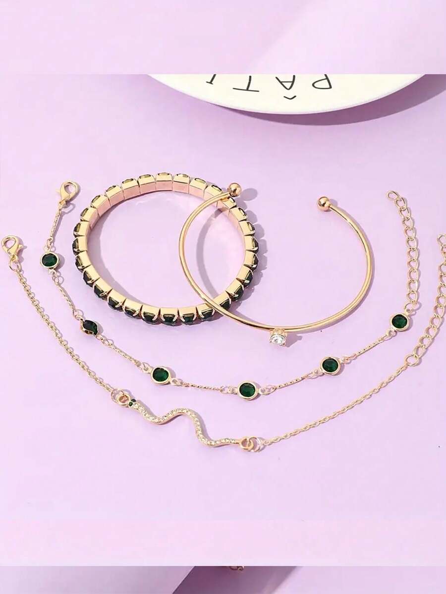 SHEIN أساور 4 قطع بكريستال أخضر بشكل ثعبان