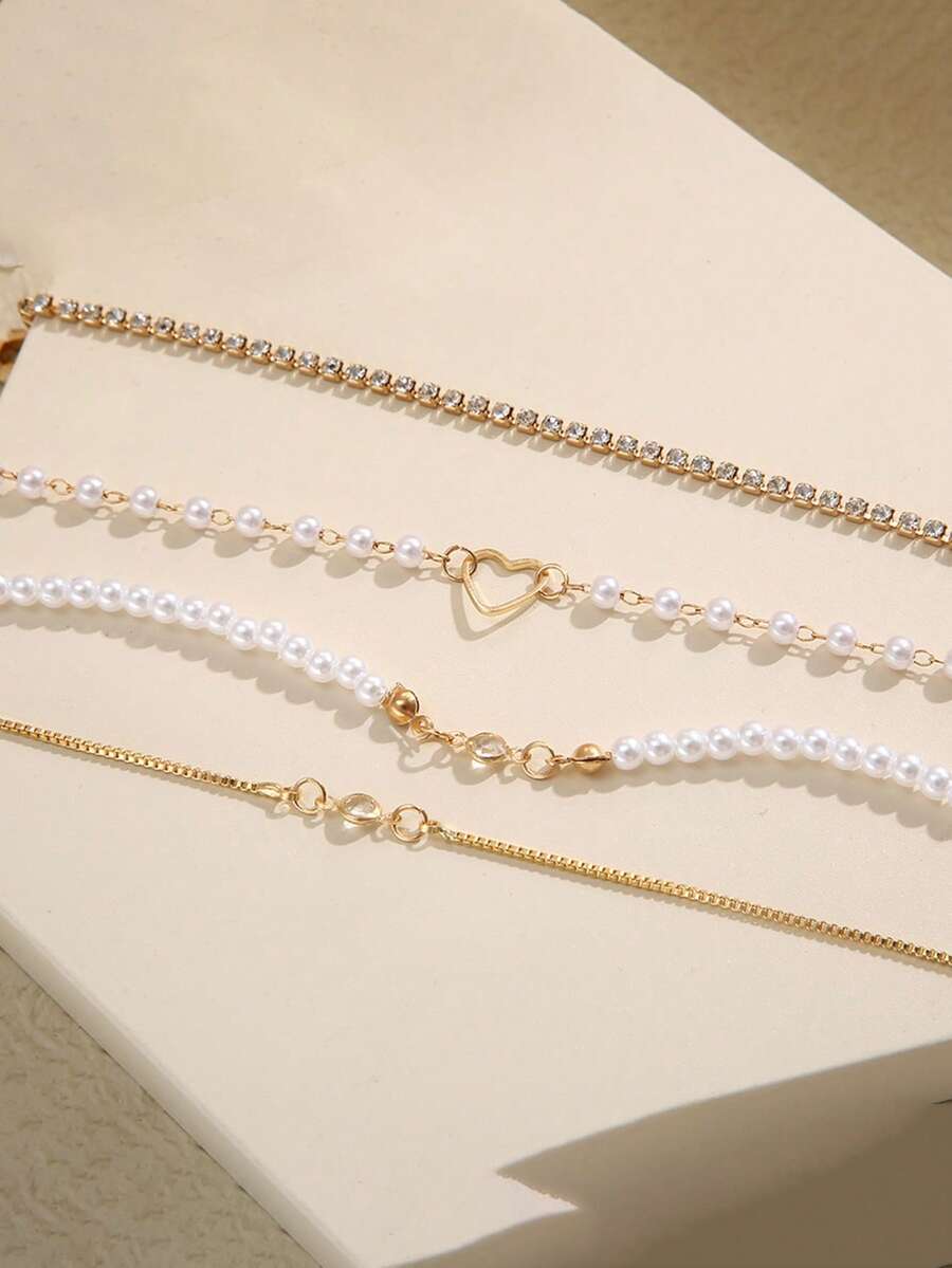 SHEIN مجموعة أساور 4 قطع ذهبية مزينة بالخرز والراين