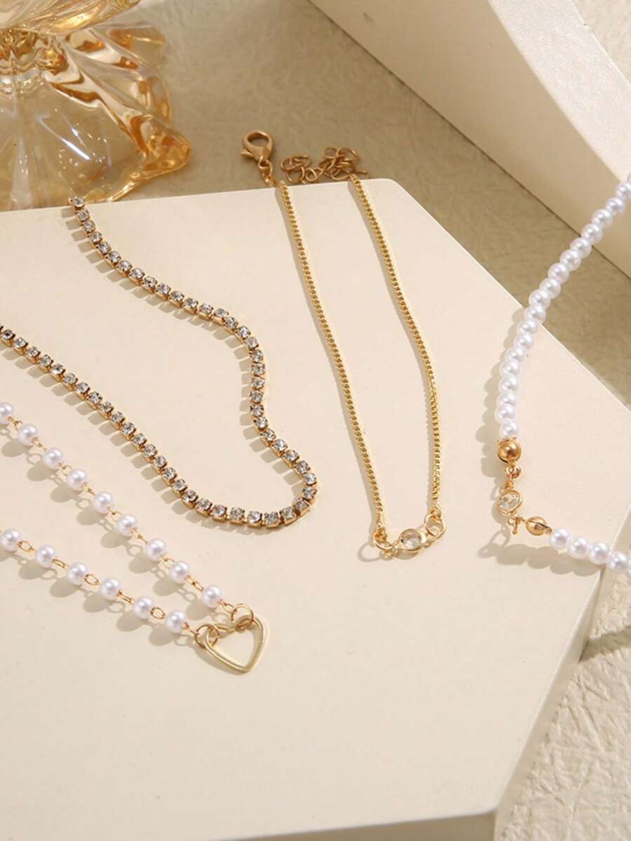 SHEIN مجموعة أساور 4 قطع ذهبية مزينة بالخرز والراين