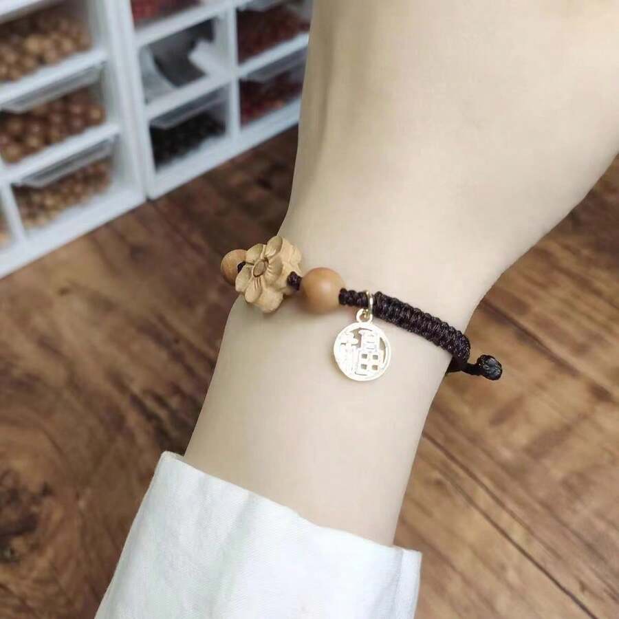 SHEIN سوار اسود يدوي مزين بزهور الخوخ