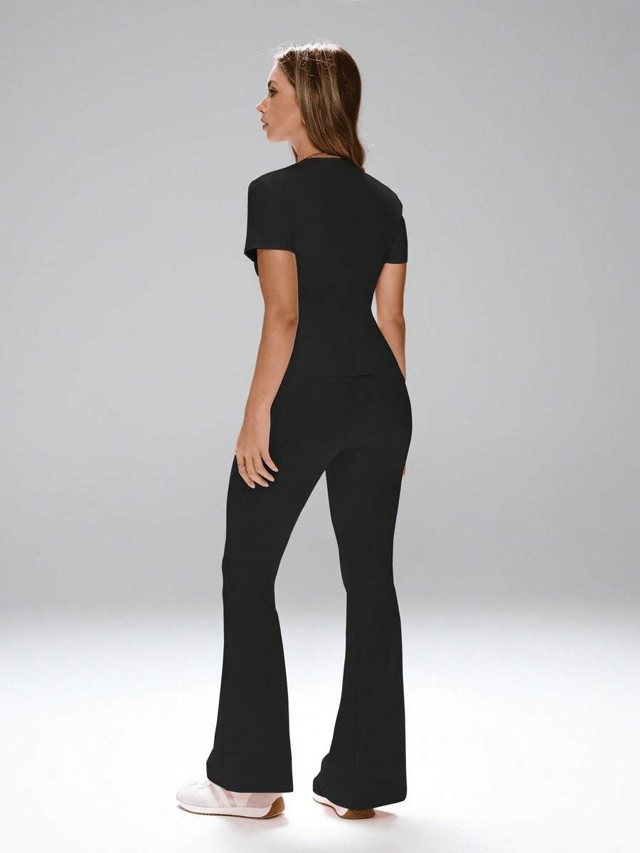 SHEIN طقم نسائي رياضي قطعتين بلون أسود