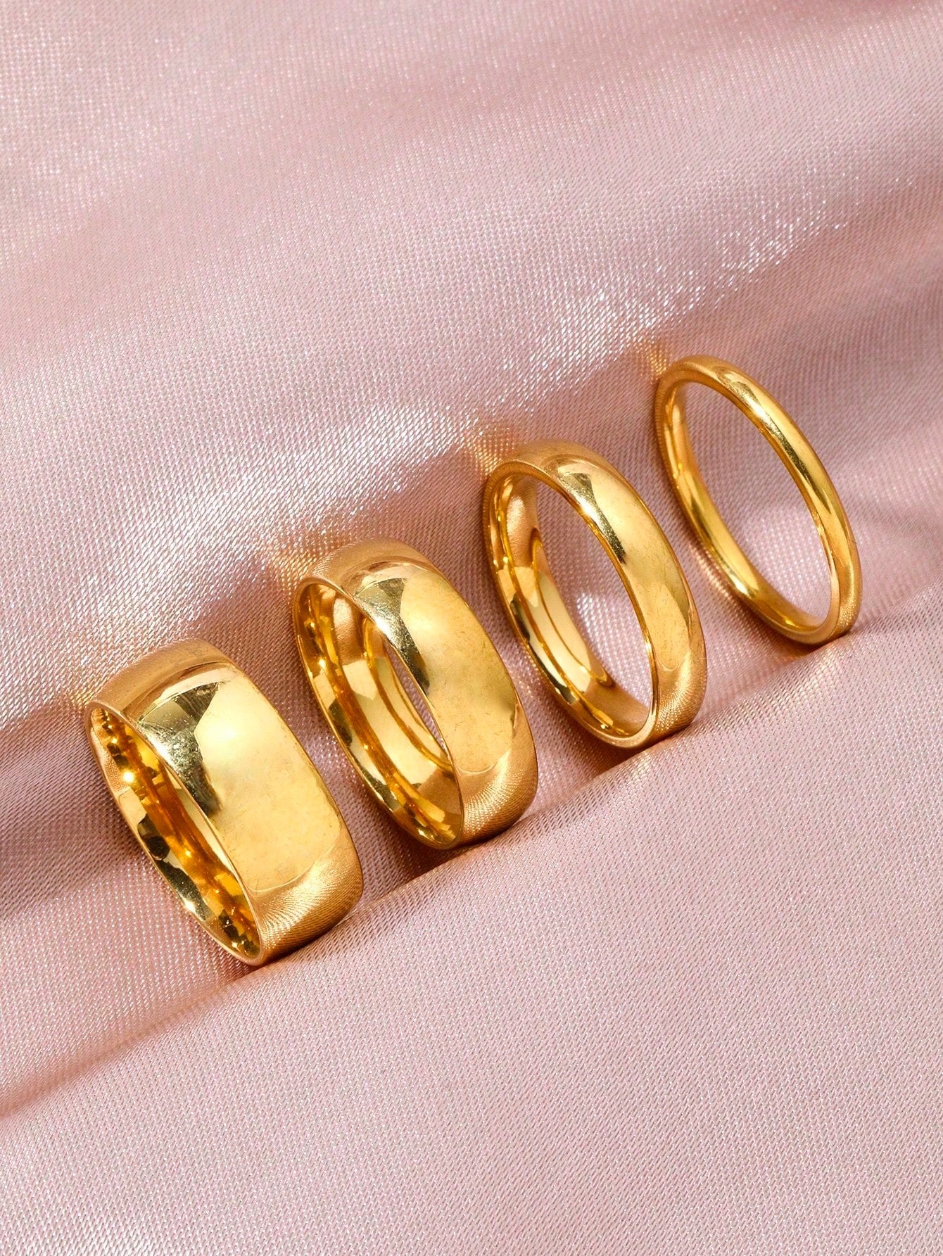 SHEIN طقم 4 خواتم ستانلس ستيل مطليين ذهب
