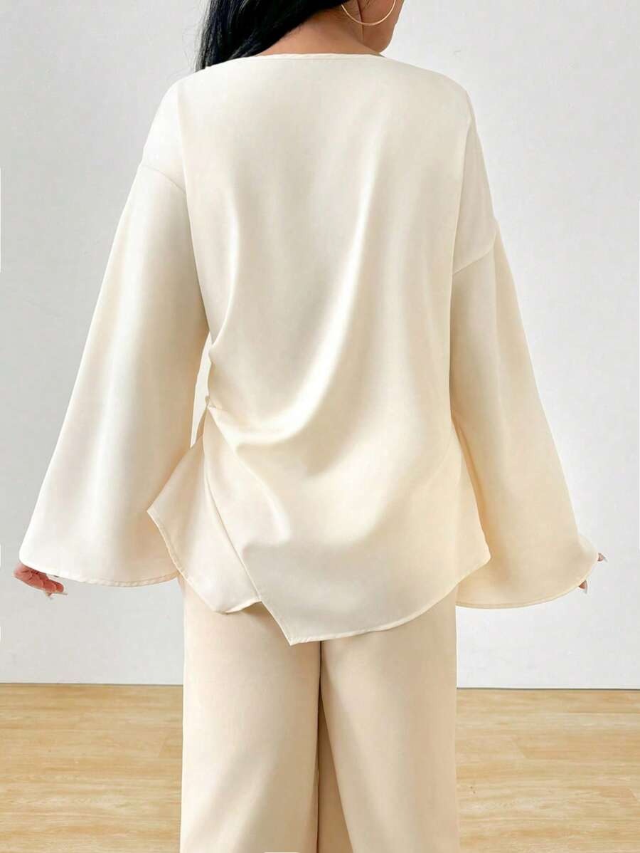 SHEIN INAWLY بلوزة ناعمة بطول مميز وقصة أنثوية