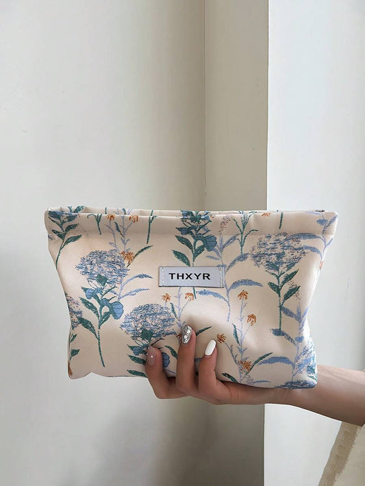 SHEIN حقيبة مكياج زرقاء واسعة بطبعة زهور أنيقة