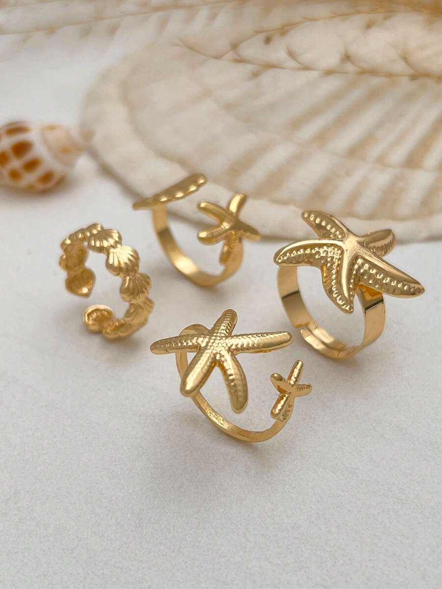 SHEIN ROMWE طقم 4 خواتم ذهبية بتصميم بحري