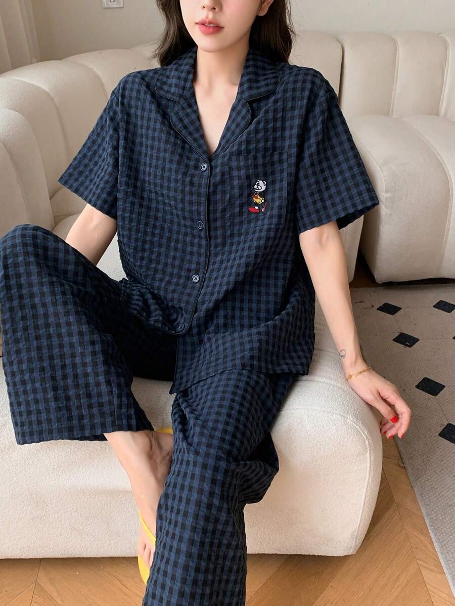 SHEIN طقم بيجامة مخططة برسوم مطرزة