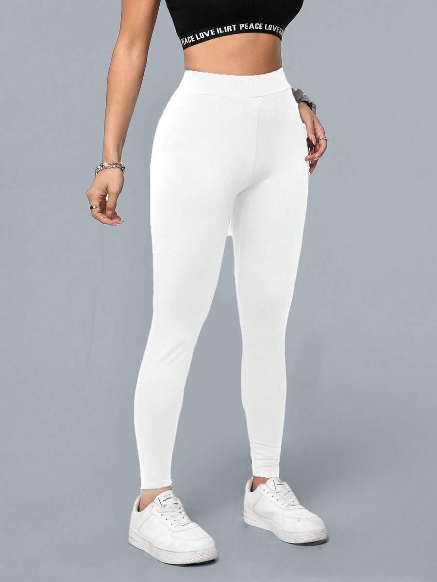 SHEIN Essnce بنطلون يوغا رياضي طويل بلون أبيض