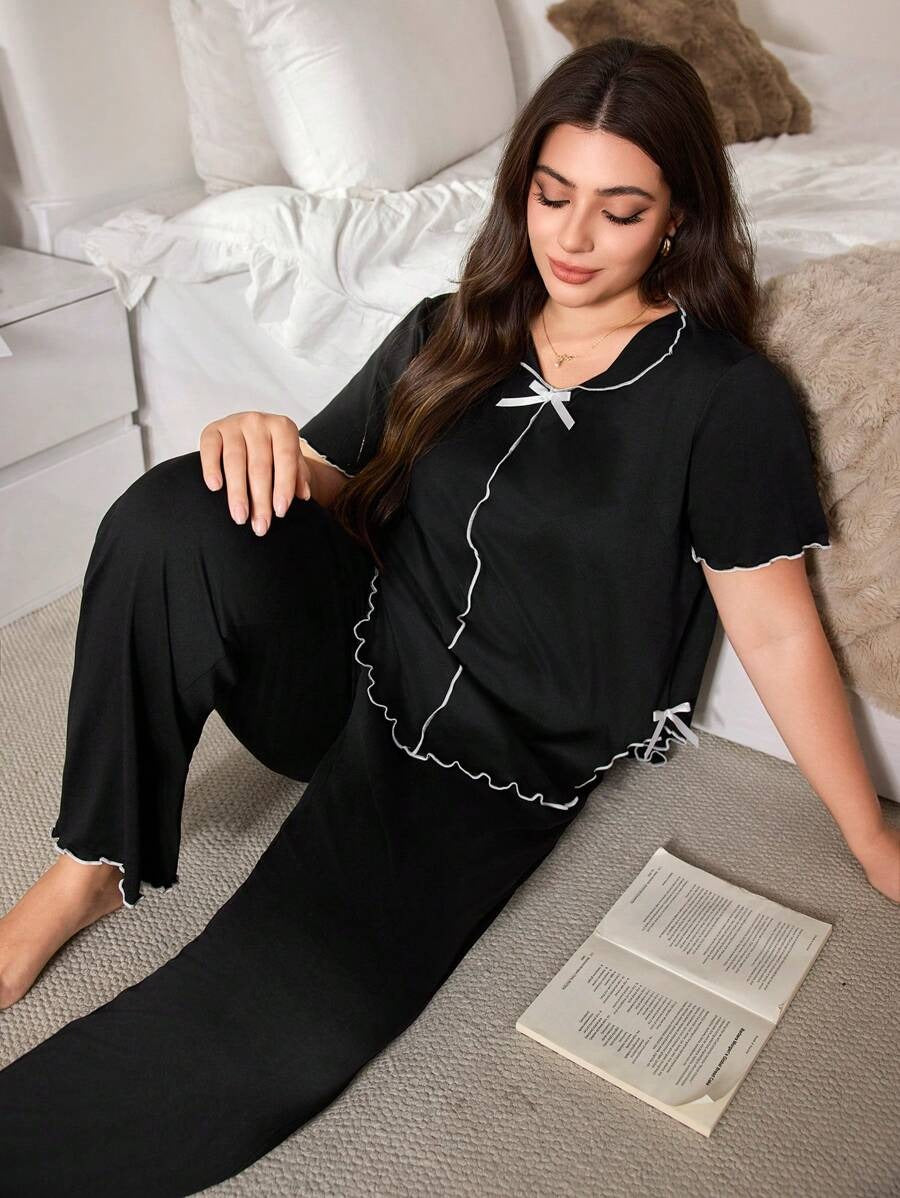 SHEIN بيجامة ساتان بلون أسود ناعمة مع فيونكة بيضاء