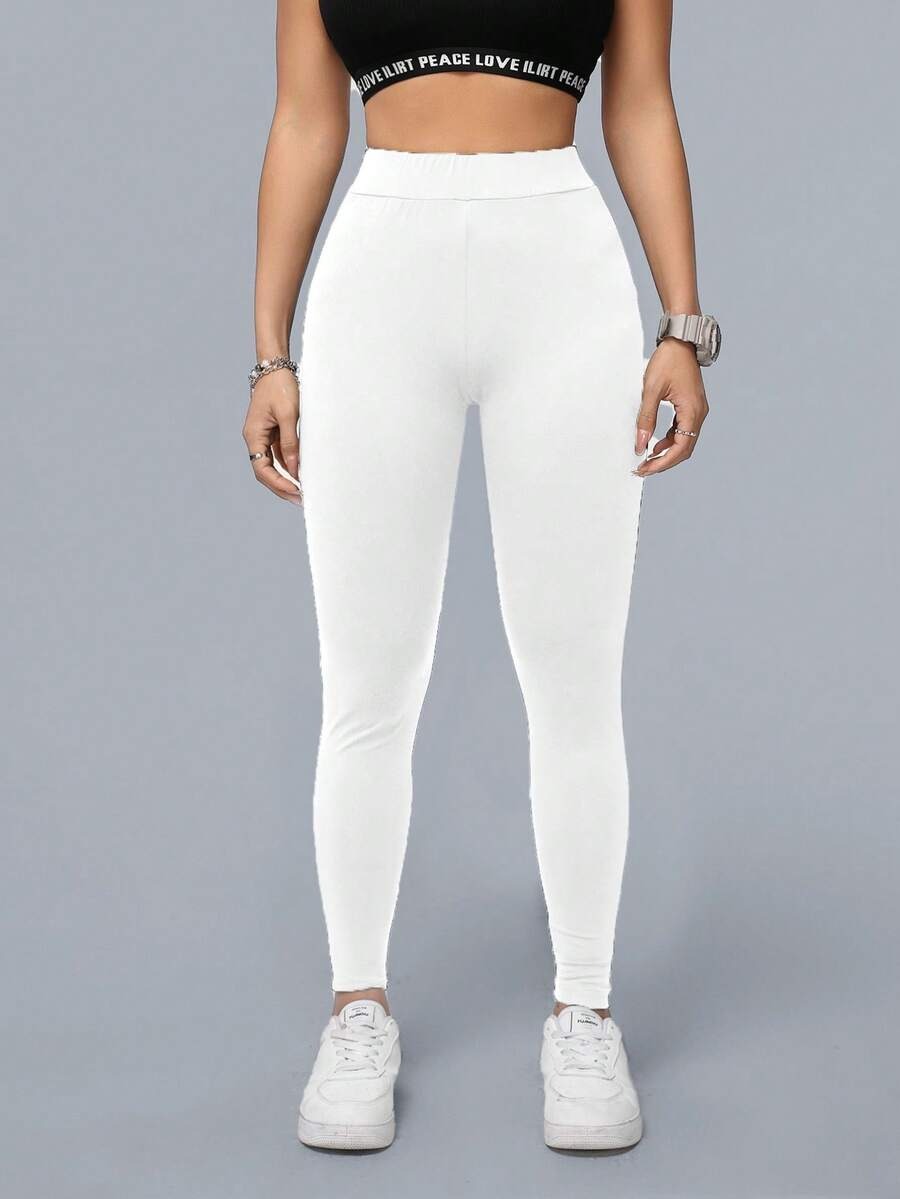 SHEIN Essnce بنطلون يوغا رياضي طويل بلون أبيض