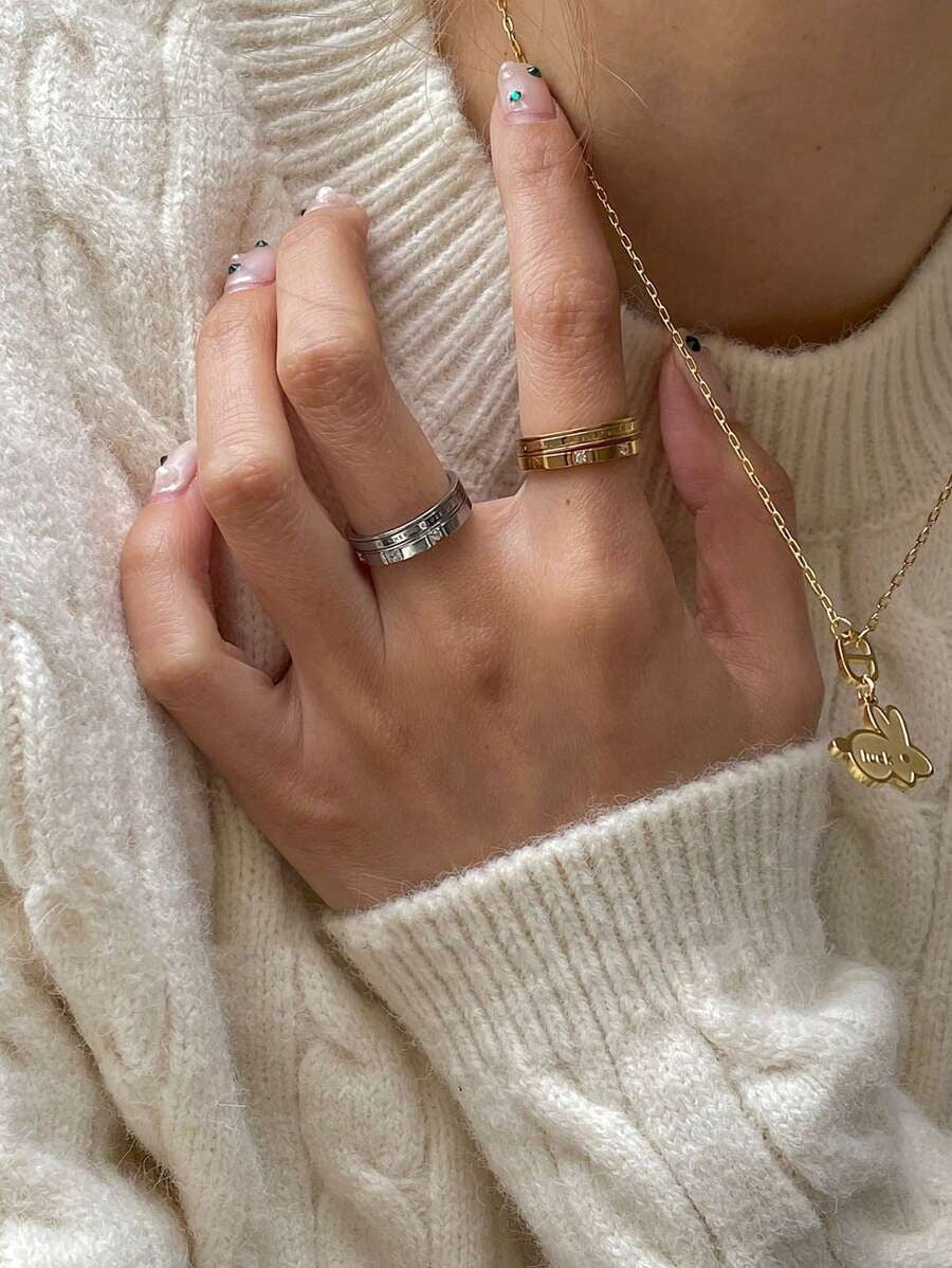 SHEIN مجموعة مكونة من خواتم ستانلس ستيل مع حروف منقوشة وزركونيا مطلية ذهب