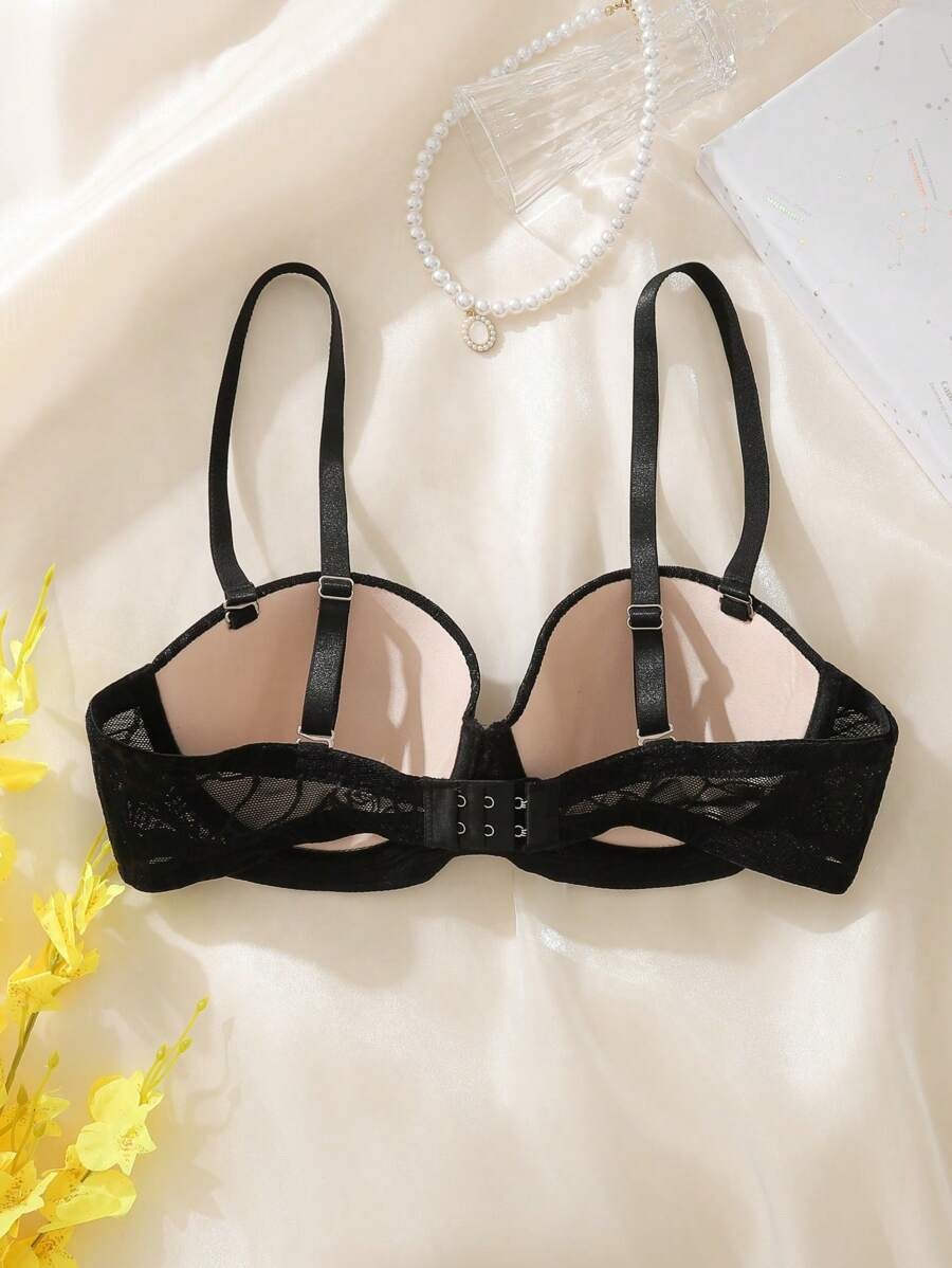 SHEIN صدرية سوداء أنيقة بزخرفة زهرية