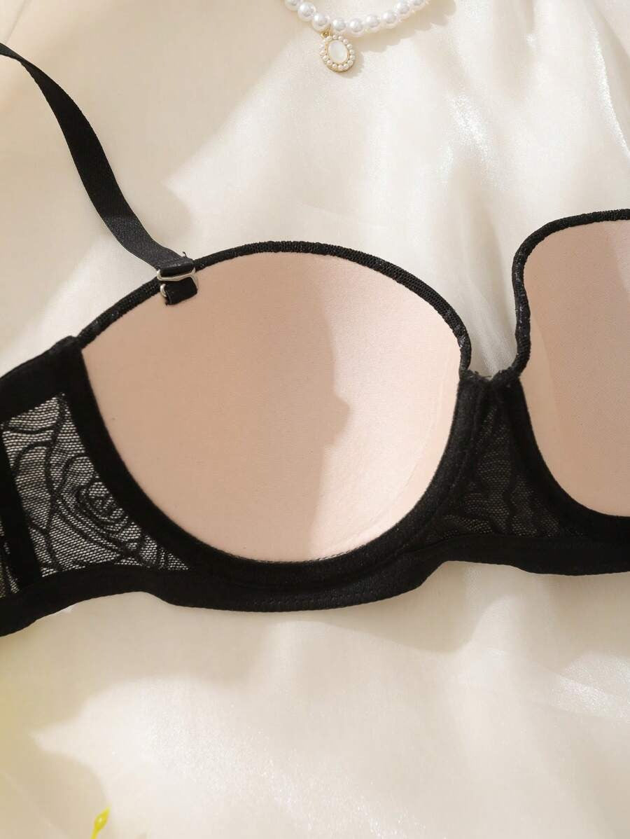 SHEIN صدرية سوداء أنيقة بزخرفة زهرية
