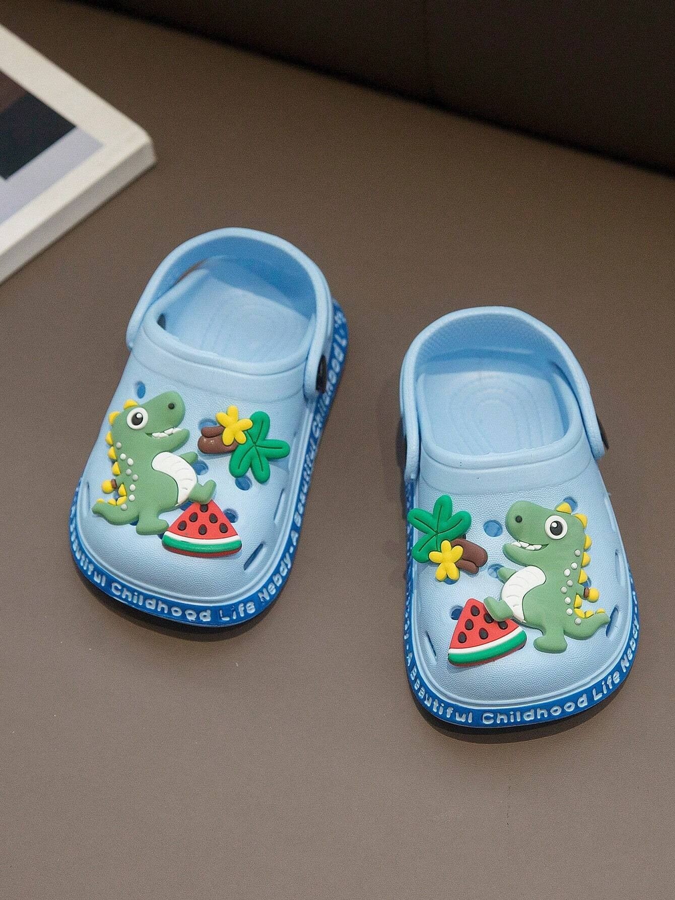 SHEIN صنادل أطفال بتصميم ديناصور كرتوني خفيفة ومقاومة للماء