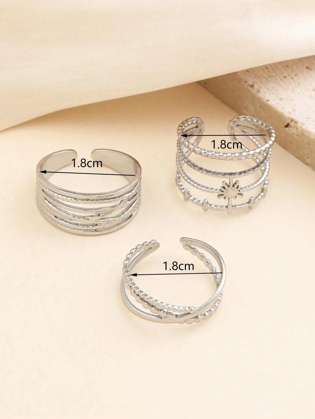 SHEIN طقم 3 خواتم فضية بشكل زهرة