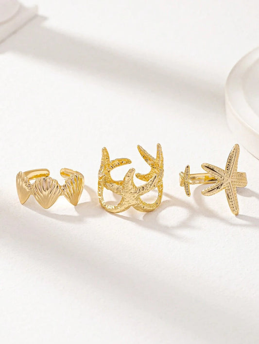 SHEIN مجموعة 3 خواتم نجمة البحر باللون الذهبي