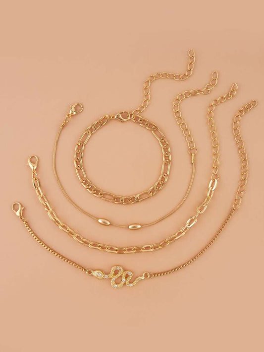 SHEIN طقم 4 سوار ذهبي مزين بحجر الراين