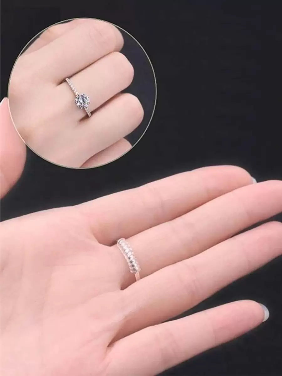 SHEIN طقم 4 قطع أدوات ضبط حجم الخاتم من السيليكون