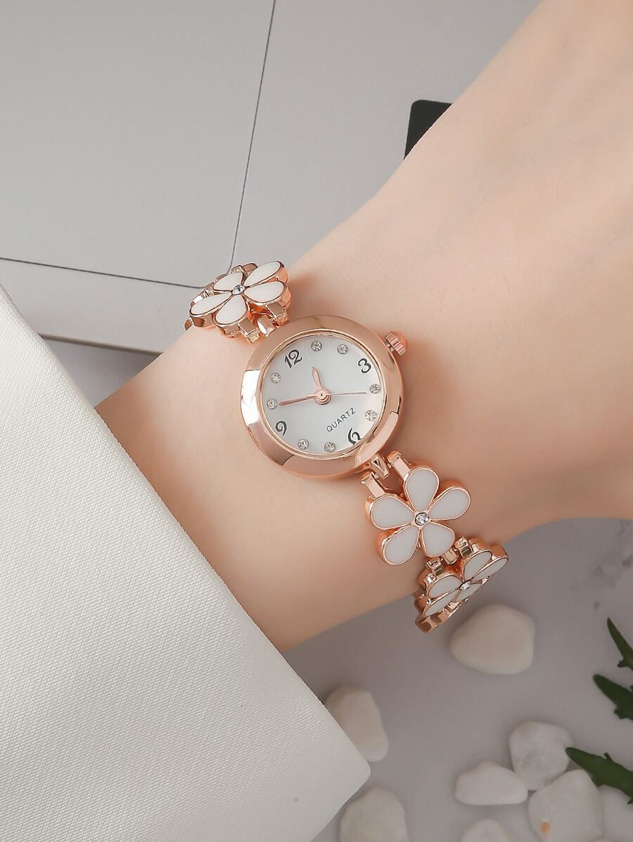SHEIN CARYINOساعة كوارتز دائرية مزخرفة بزهور
