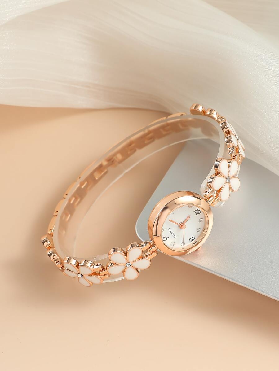SHEIN CARYINOساعة كوارتز دائرية مزخرفة بزهور