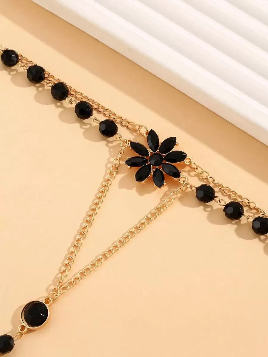 SHEIN أساور سوداء مزينة بالزهور