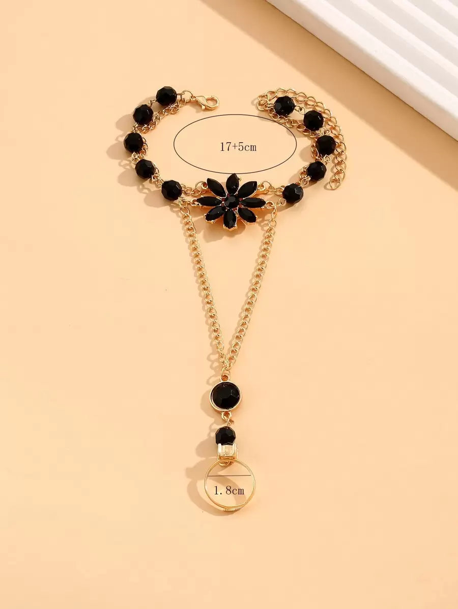 SHEIN أساور سوداء مزينة بالزهور