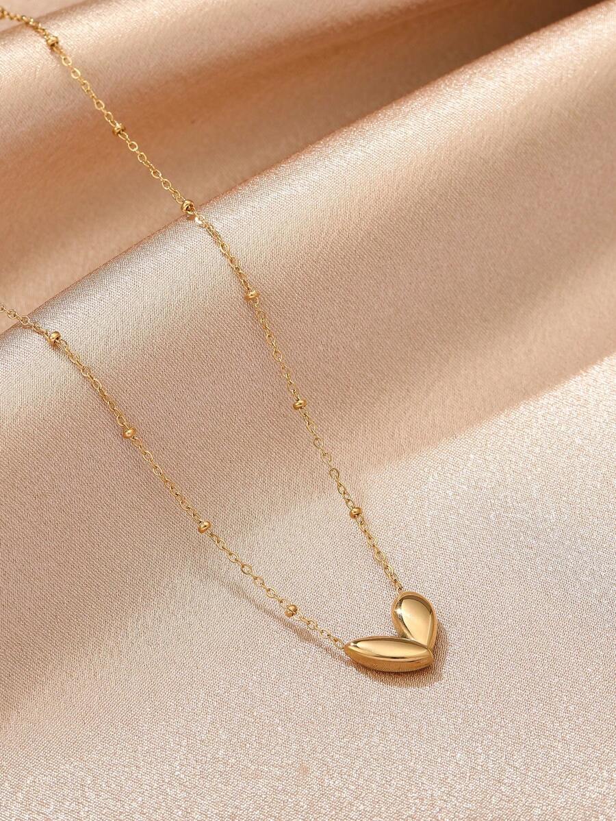 SHEIN قلادة قلب محفور ستانلس ستيل