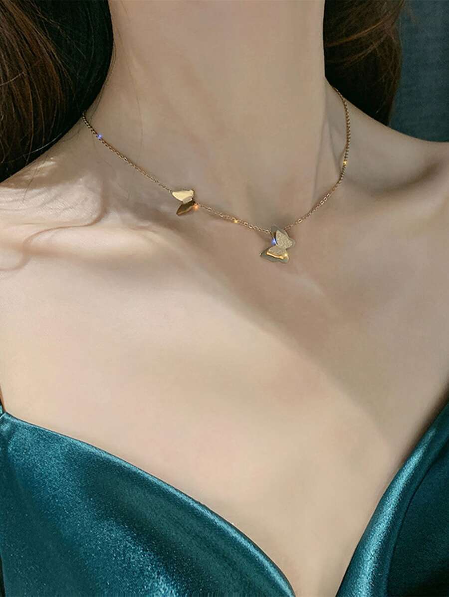 SHEIN طقم مجوهرات عقد وأقراط فولاذ مقاوم للصدأ بتصميم فراشة