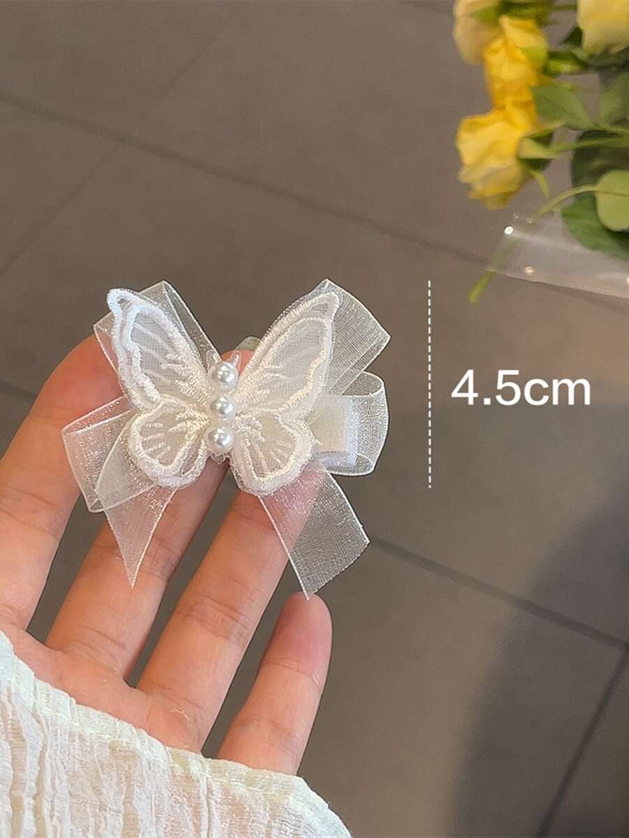 SHEIN طقم 4 قطع مشابك شعر بشكل فراشة بيضاء مزينة خرز وقماش