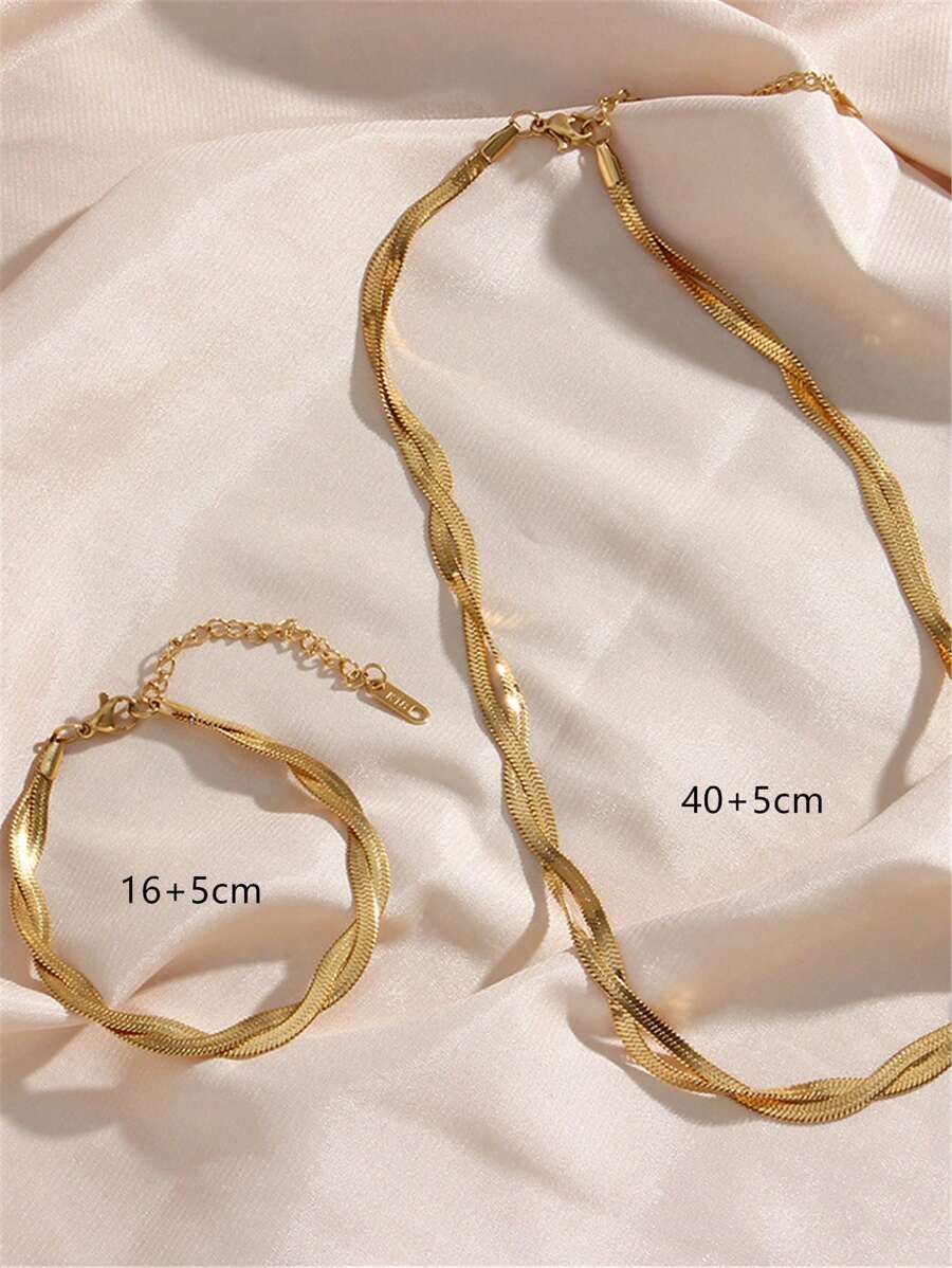 SHEIN مجموعة قلادة وسوار بتصميم متقاطع من الفولاذ المقاوم للصدأ