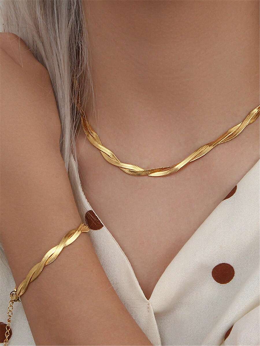 SHEIN مجموعة قلادة وسوار بتصميم متقاطع من الفولاذ المقاوم للصدأ