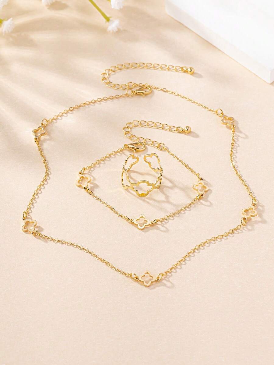 SHEIN طقم مجوهرات معدنية قلادة وسوار وخاتم بتصميم زهور وبرسيم