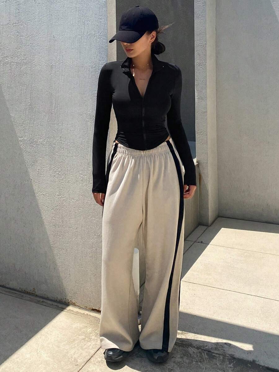 SHEIN DAZY قميص نسائي رياضي ضيق