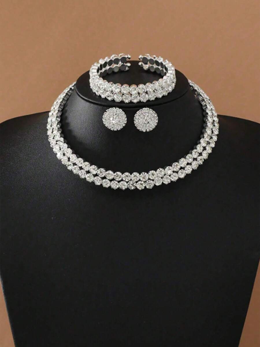 SHEIN طقم مجوهرات فضي قلادة وأقراط وسوار كريستالات