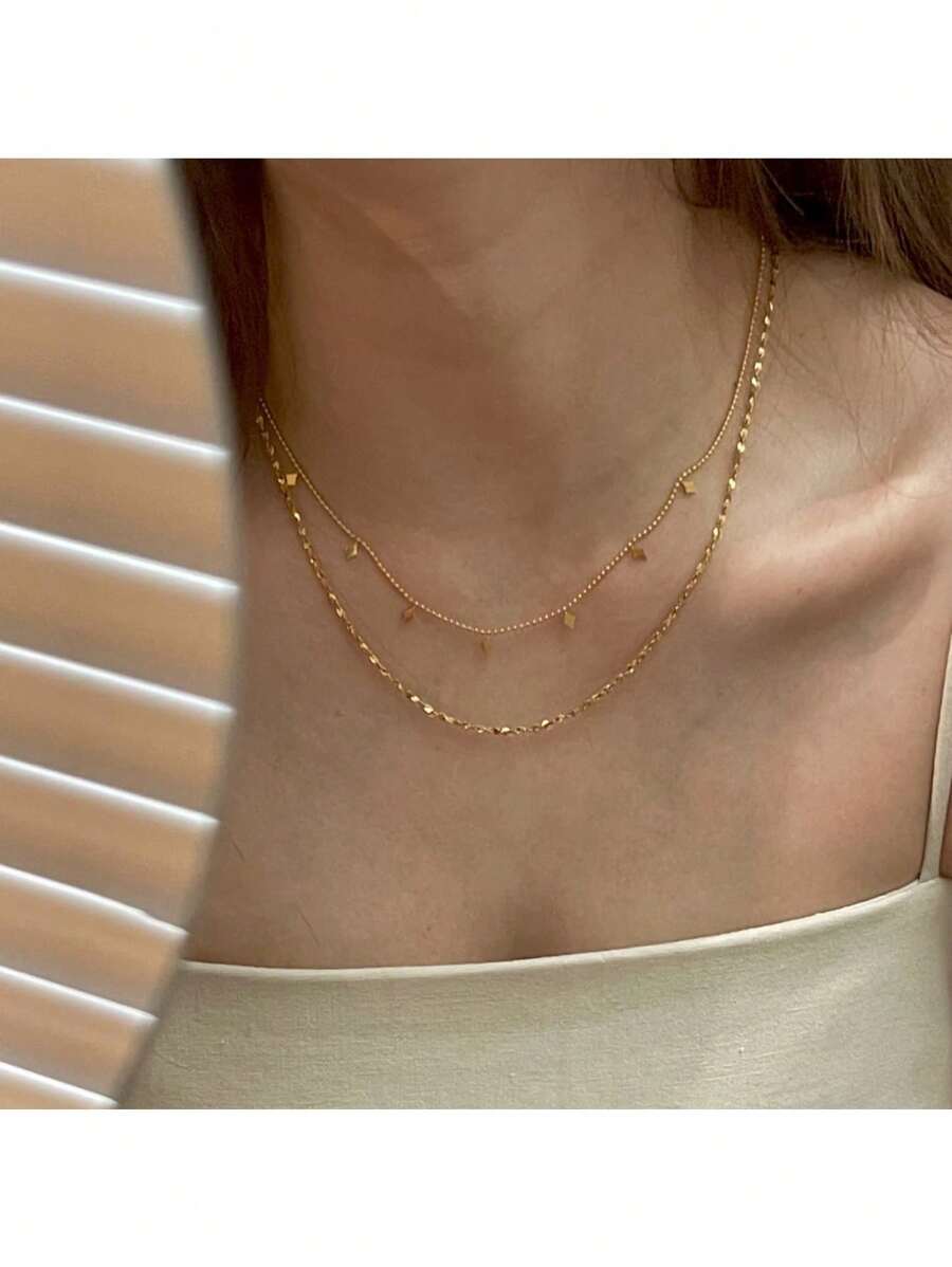 SHEIN قلادة فولاذية بطبقتين مزينة بخيوط كشكشة وخرز ذهبي