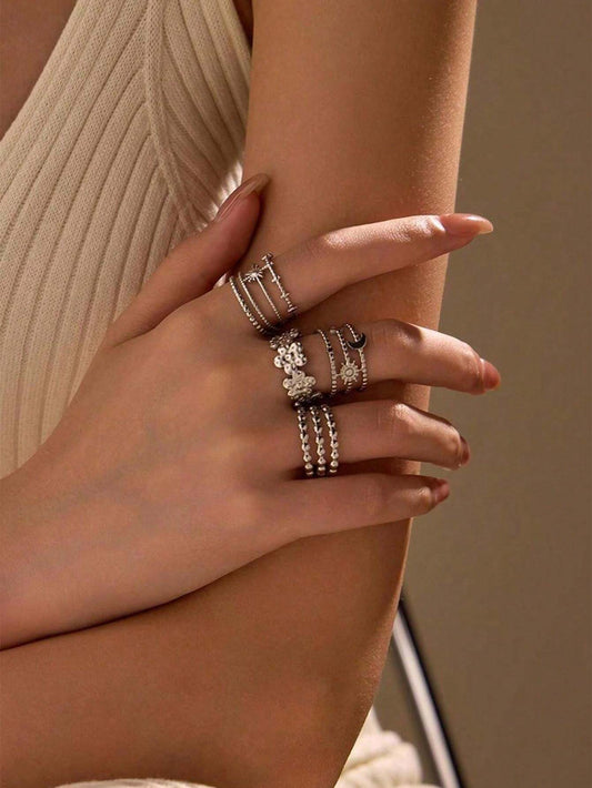 SHEIN quality طقم خواتم 4 قطع بتصميم زهور ونجوم وأقمار