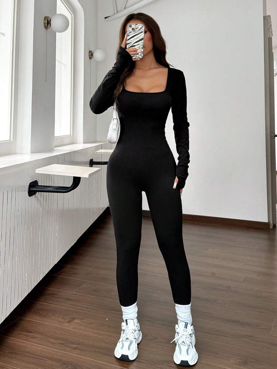 SHEIN EZwear جمبسوت رياضي أسود ضيق بياقة عالية
