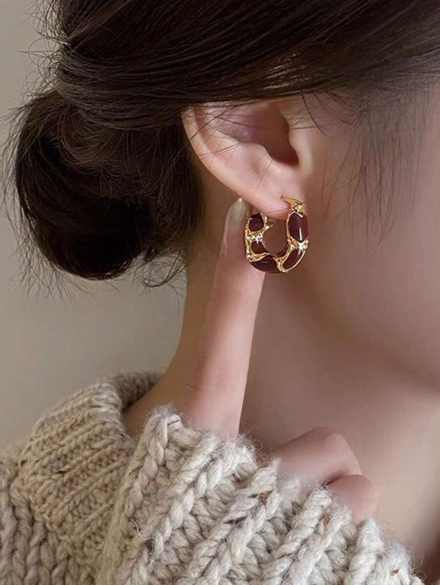 SHEIN  أقراط مع تصميم دائري