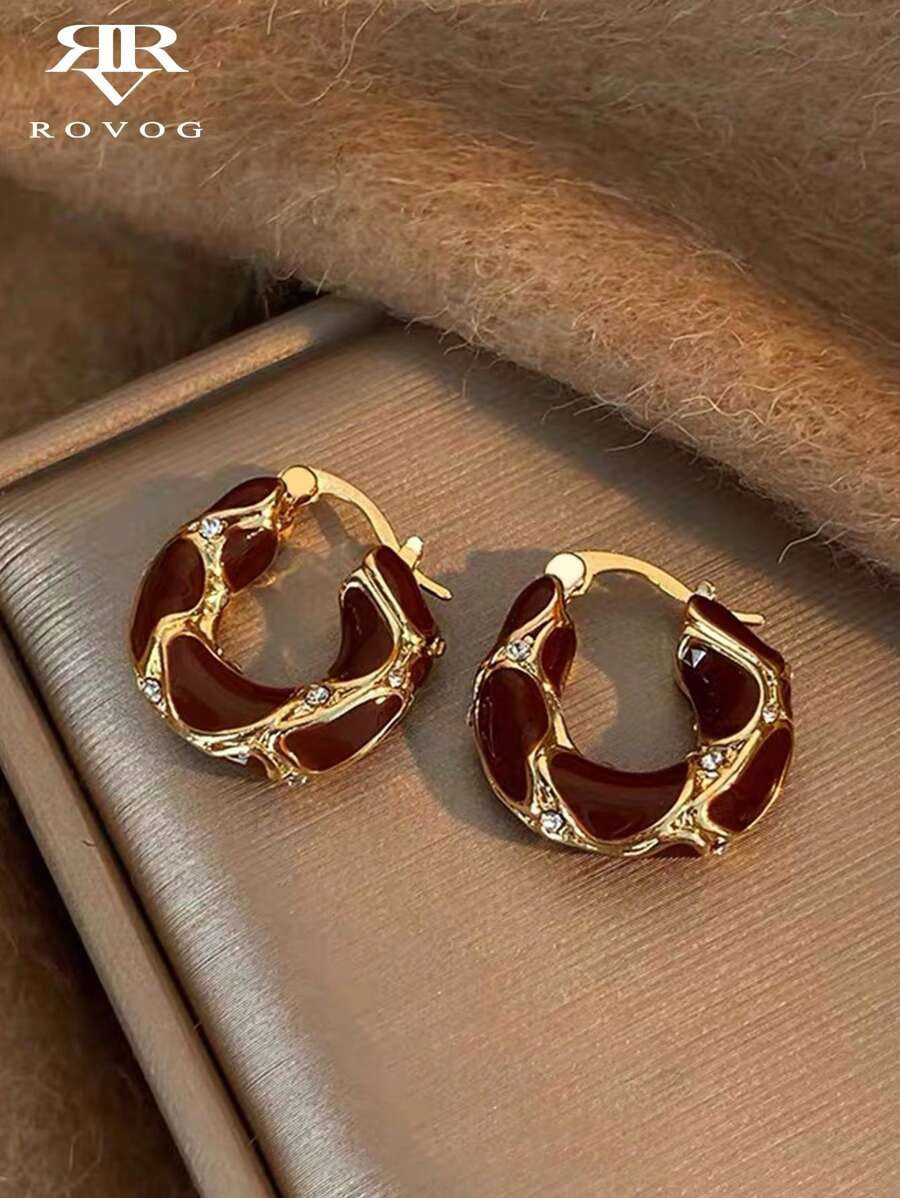 SHEIN  أقراط مع تصميم دائري