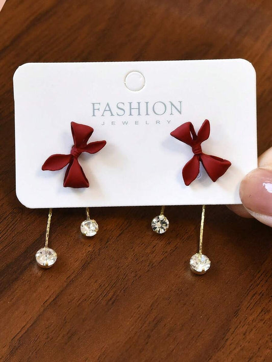 SHEIN أقراط أنيقة بتصميم عقدة الفراشة