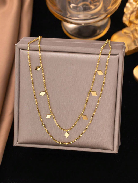SHEIN قلادة فولاذية بطبقتين مزينة بخيوط كشكشة وخرز ذهبي